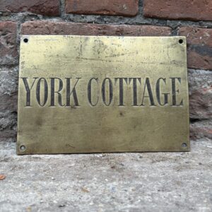 A vintage solid brass “YORK COTTAGE”